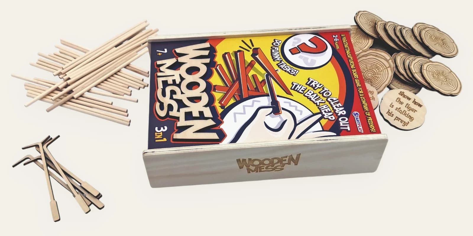Open Wooden Mess set with the box, sticks, shovels and challenge cards